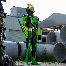 kamen rider ooo gives fingerguns to the up right